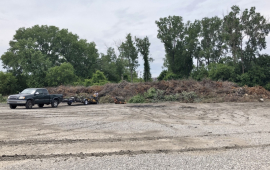 Vehicles dropping off branches at the brush site.