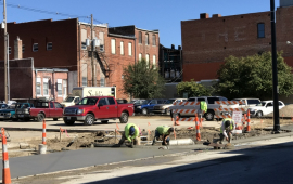 Contractors fill in concrete around a refurbished parking lot at Sixth and Cherokee streets in downtown Leavenworth in 2018.