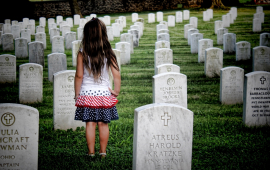 girl at gravesite