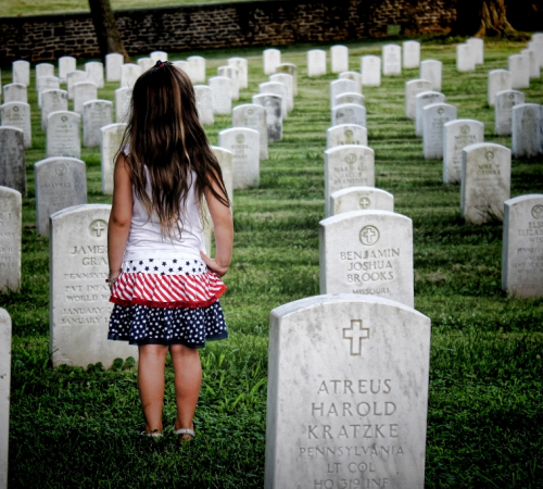 girl at gravesite