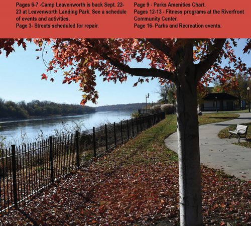 cover of newsletter with photo of tree with red leaves by the river