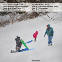 photo of First City Connection magazine cover with children carrying sleds up a snowy slope