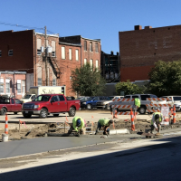 Contractors fill in concrete around a refurbished parking lot at Sixth and Cherokee streets in downtown Leavenworth in 2018.