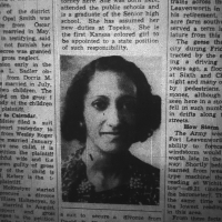 Newspaper clipping with picture of a young woman with curly hair and dark skin wearing earrings and flowered print dress