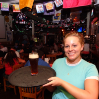 Lady serving a beer