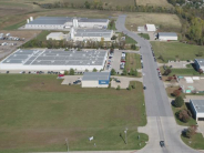 Photo shows large businesses occupying space in business park