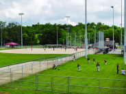 Young baseball players practicing at Sportsfield