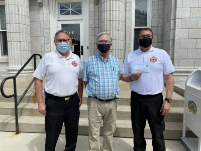 Fire department and city mayor with face masks