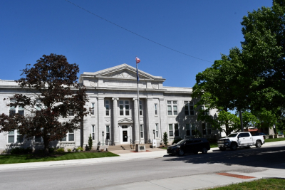 Leavenworth City Hall with green trees and a blue sky